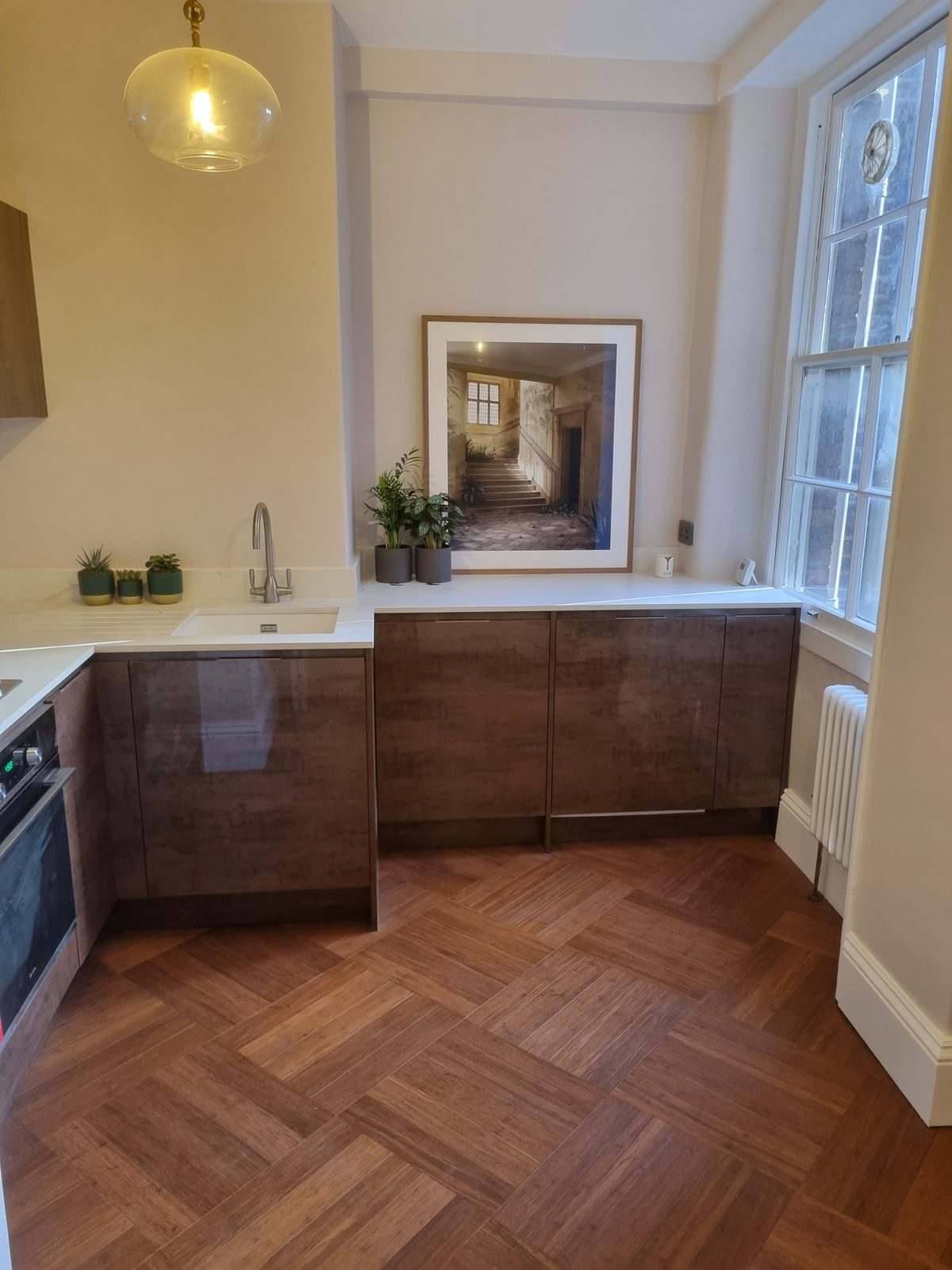A herringbone parquet floor in a period kitchen — JAG Construction, Devonshire House